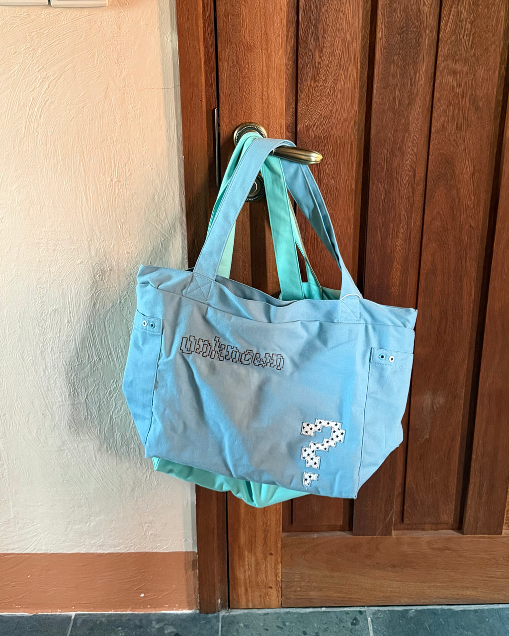 "Unknown" Tote Bag 2026